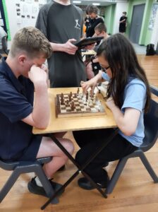 2 boys playing chess