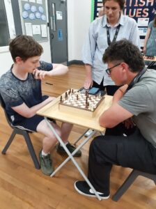 2 pupils concentrating on Chess