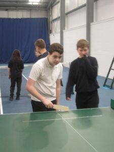 Children playing tabletop cricket