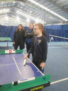 Child playing tabletop cricket