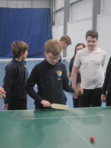 Children playing tabletop cricket