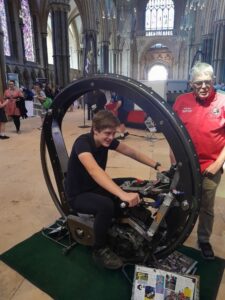 Ambergate pupil got to sit on the fastest monowheel motorcycle