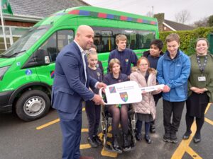 Ambergate pupils with their new minibus