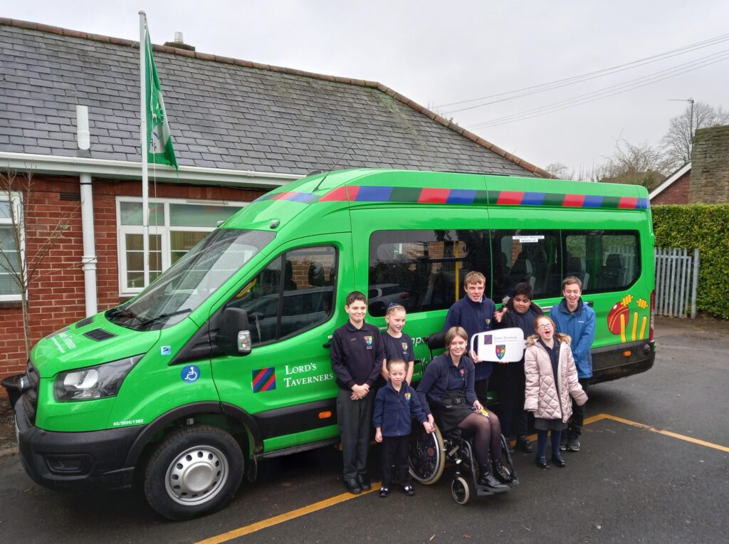 Ambergate pupils with their new minibus