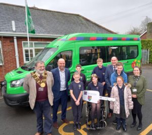 Ambergate pupils with their new minibus